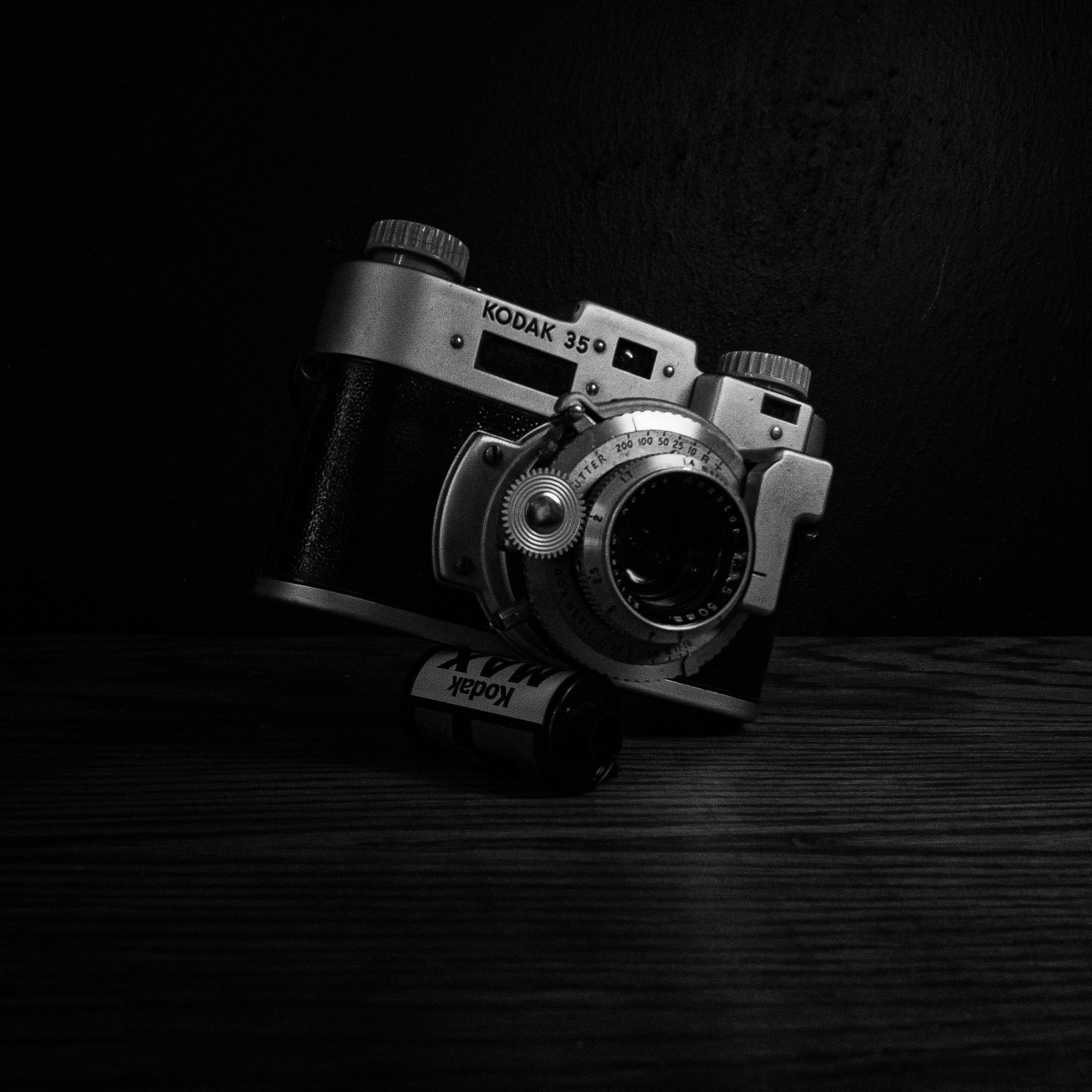 a black and white photo of a camera